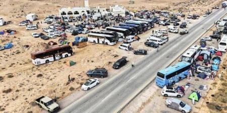 "قافلة
      الصمود"
      تتراجع
      عن
      التوجه
      إلى
      معبر
      رفح
      وتواصل
      اعتصامها
      غرب
      سرت