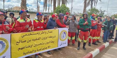 عمال
      "أوزون"
      يطالبون
      بصرف
      الأجور