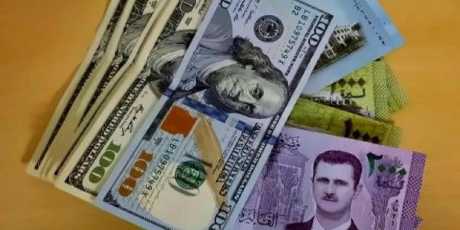 سعر الليرة السورية أمام الدولار الأمريكي في بداية التعاملات الصباحية